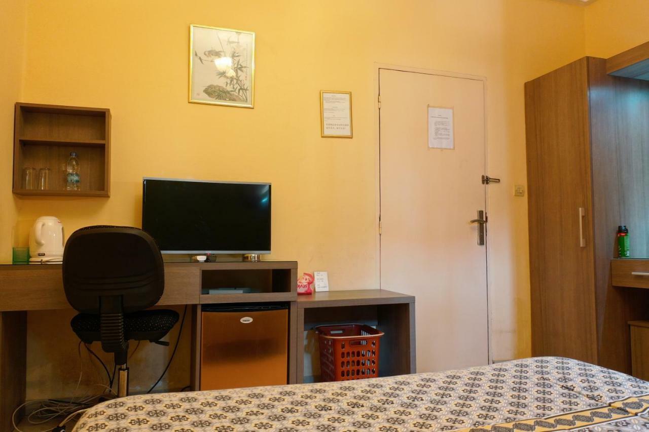 Petit Motel Beijing Abidjan Esterno foto