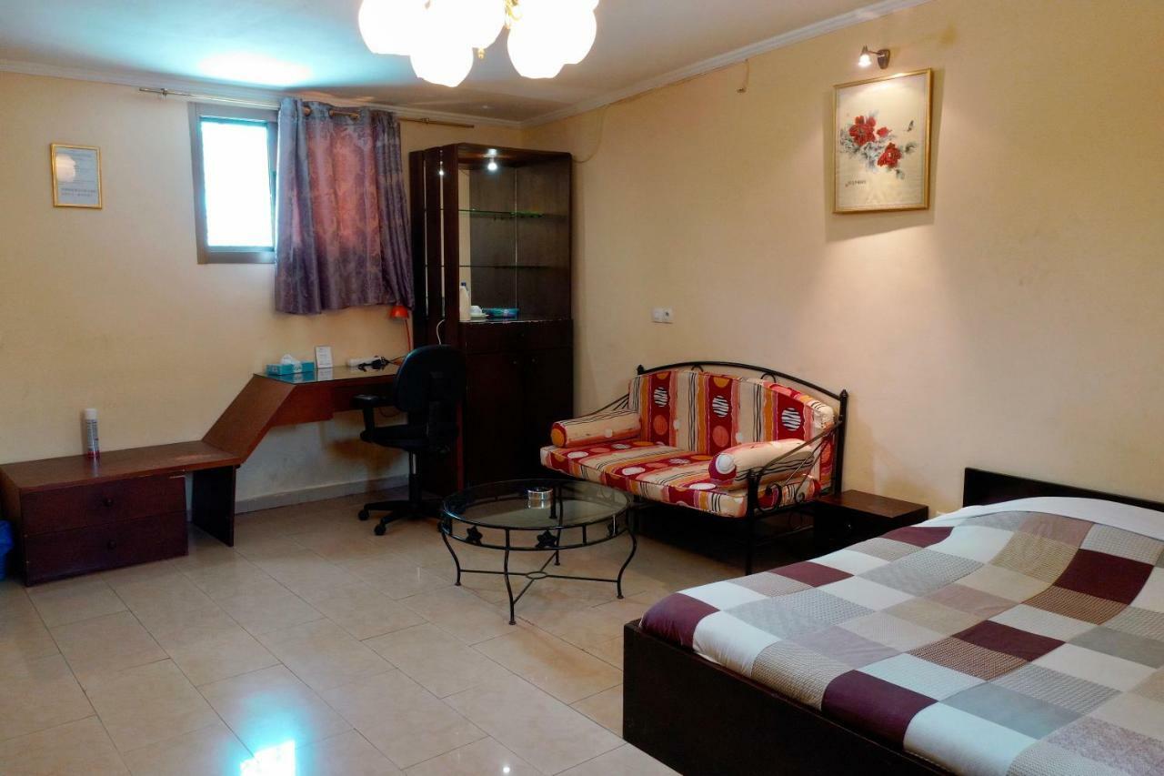 Petit Motel Beijing Abidjan Esterno foto