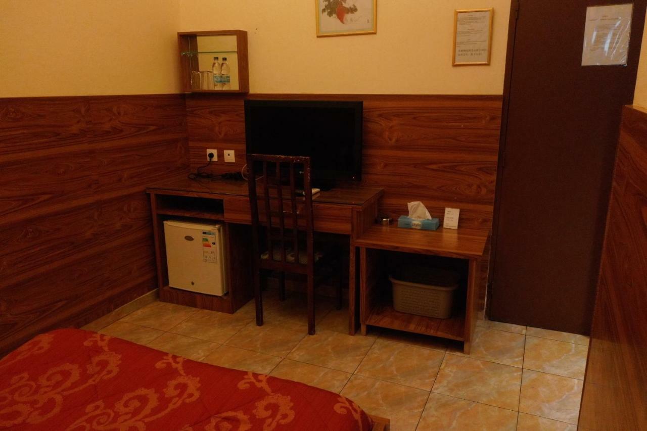 Petit Motel Beijing Abidjan Esterno foto