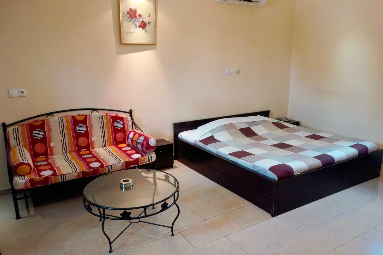 Petit Motel Beijing Abidjan Esterno foto
