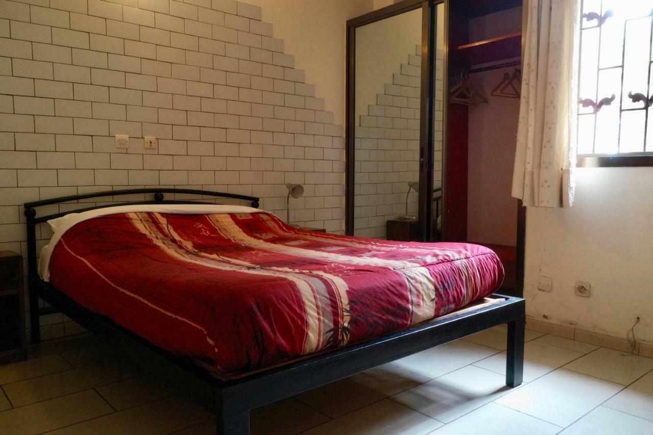 Petit Motel Beijing Abidjan Esterno foto